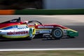 Formula racing car speed action on asphalt racetrack blurred motion background