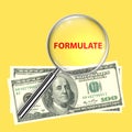 formulate under magnifier glass on yellow Royalty Free Stock Photo