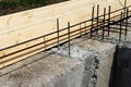 Formwork for the foundation of the house. Closeup of house foundation made from concrete shuttering blocks filled with mortar and