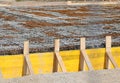 formwork made with yellow planks during laying cement to make the foundation of the building on the construction site Royalty Free Stock Photo