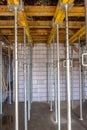 formwork - metal poles supporting the slabs on which concrete will be poured to make the ceiling in the building Royalty Free Stock Photo