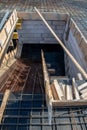 formwork - metal poles supporting the slabs on which concrete will be poured to make the ceiling in the building Royalty Free Stock Photo