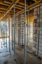 formwork - metal poles supporting the slabs on which concrete will be poured to make the ceiling in the building Royalty Free Stock Photo