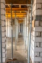 formwork - metal poles supporting the slabs on which concrete will be poured to make the ceiling in the building Royalty Free Stock Photo