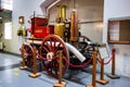 Historical Glenlossie Fire Engine as a horse-drawn vehicle displayed at museum in Dallas Dhu Distillery which produces whiskey