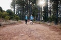 Forrest, hiking and old couple walking dog on path in mountain in Australia for fitness and exercise. Travel, man and Royalty Free Stock Photo