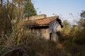 Forsaken tile-roofed brick building in weeds,in former 630 factory