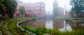 Forssa Finland, the old spinning mill of red brick on a foggy day and river