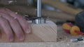 Forstner drill with wood filings slow motion macro footage.Joiner`s workshop and woodworking