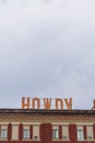 The classic rooftop sign of the historical Howdy Hotel