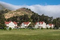 Fort Baker buildings under hill with fog Royalty Free Stock Photo