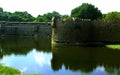 Fort battlement with reflection in trench