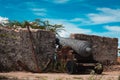 Old vintage cannons and an anchor rusting away in the fort Royalty Free Stock Photo