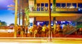 FORT LAUDERDALE, FL - FEBRUARY 2016: People enjoy night life at local pubs, traffic on the foreground