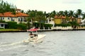 Fort Lauderdale, Florida, U.S - November 18, 2018 - The view of boat on the canal and luxury waterfront homes by the bay