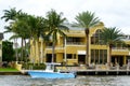 Fort Lauderdale, Florida, U.S - November 18, 2018 - The view of luxury waterfront home with boat by the bay Royalty Free Stock Photo