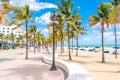 Fort Lauderdale, Florida, USA - September 20, 2019: Seafront beach promenade with palm trees on a sunny day in Fort