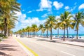 Fort Lauderdale, Florida, USA - September 20, 2019: Seafront beach promenade with palm trees on a sunny day in Fort