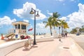 Fort Lauderdale, Florida, USA - September 20, 2019: Seafront beach promenade with palm trees on a sunny day in Fort