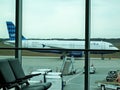 Fort Myers,FLA,USA,May 7,2019. Jet Blue plane coming into terminal.view from window while waiting to board plane.