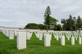 Fort Rosecrans National Cemetery with gravestones in rows during cloudy day