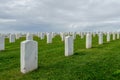 Fort Rosecrans National Cemetery with gravestones in rows during cloudy day