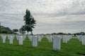 Fort Rosecrans National Cemetery with gravestones in rows during cloudy day