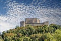 The Fort of San Leo, also known as the Rocca di San Leo, Rimini, Italy, under a dramatic sky Royalty Free Stock Photo