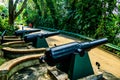 Cannons on display at Fort Siloso, Sentosa Island, Singapore. Royalty Free Stock Photo