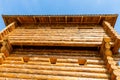 Fort wooden high log wall old windows background sky tradition europe protection of the city