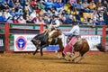 Saddle bronc and bareback bronc riding competition in the Stockyards Championship Rodeo Royalty Free Stock Photo