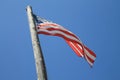 American flag flying from old pole Key West Royalty Free Stock Photo