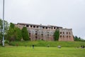 Forte Begato with people playing football in front of it