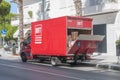 A BRT Bartolini express courier van parked in the city during a delivery