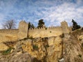 Fortification wall on the edge of the mountain Titano, San Marino