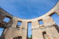 Fortification wall of a ruin of a ancient castle in Poland. Janowiec Castle. Wide perspective view with blue sky in the background Royalty Free Stock Photo