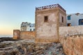 Fortification wall in Essaouira, Morocco, at sunset.