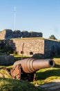 Fortifications and a cannon at Suomenlinna Sveaborg , sea fortress island in Helsinki, Finla Royalty Free Stock Photo