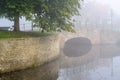 Fortified bridge reflection in water