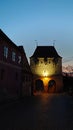 Fortified citadel of Sighisoara, Romania, by night - UNESCO heritage - historical landmarks