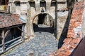 Fortified gate on medieval streets of Sighisoara, Romania