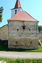 Fortified medieval saxon church in Bruiu - Braller, Transylvania, Romania. Royalty Free Stock Photo