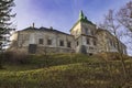 Fortress on a green hill. Olesko castle . Western Ukraine Royalty Free Stock Photo
