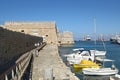 Fortress Koules with anchoring fishermen boats Royalty Free Stock Photo