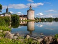 Fortress on the lake.blue sky with clouds. Royalty Free Stock Photo