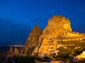 Fortress on the rock in the town of Uchisar in night, Cappadocia, Turkey Royalty Free Stock Photo