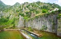 The fortress wall of Bastion Riva near the river Shkurda, the Old town of Kotor, Montenegro,Balkans,Europe. Royalty Free Stock Photo