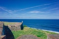 Fortress wall and sentry box over blue sea in Old San Juan, Puerto Rico Royalty Free Stock Photo