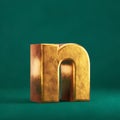 Fortuna Gold Letter N lowercase on Tidewater Green background