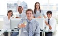 Fortunate business team drinking champagne Royalty Free Stock Photo